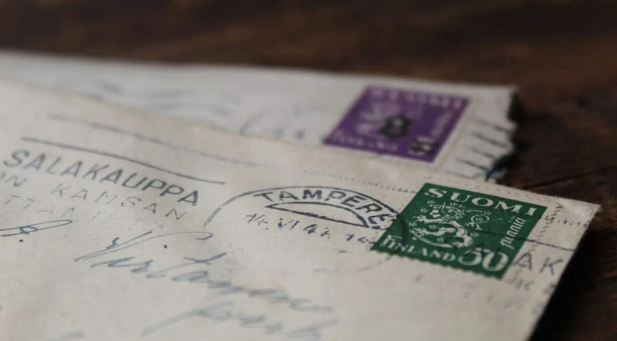 A sheet of white paper tucked into an envelope