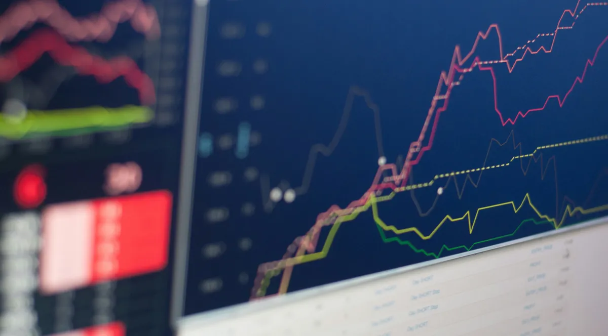 Colored market charts on a trading screen